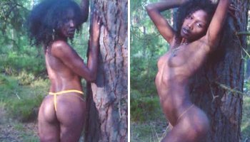 Nude ebony woman in nature